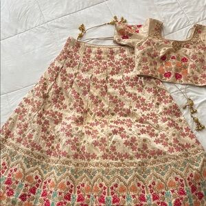 Lehenga Beautiful two piece cream with gold, teal, and pink with Dupatta.